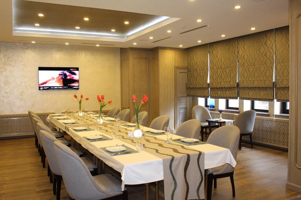 Ramada By Wyndham Bishkek Centre Hotel Exterior photo