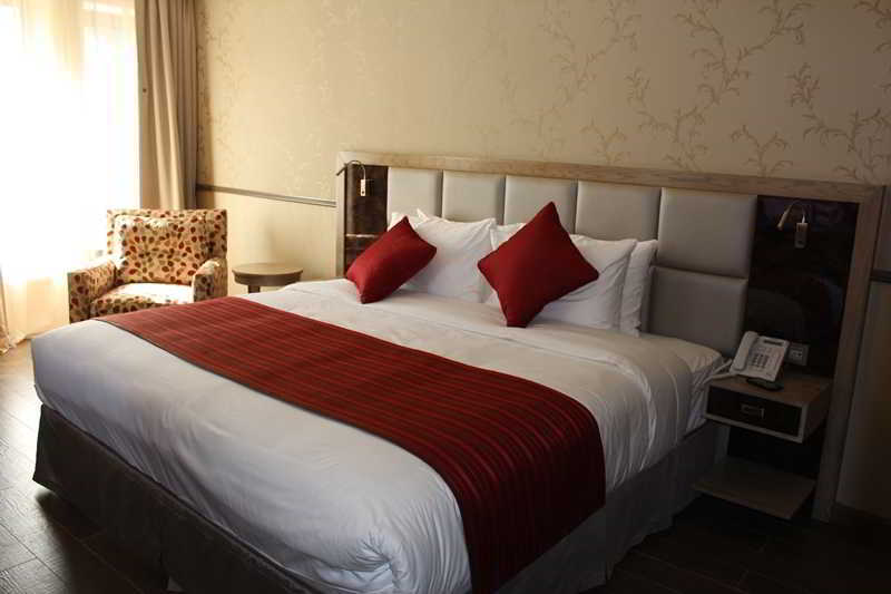 Ramada By Wyndham Bishkek Centre Hotel Exterior photo