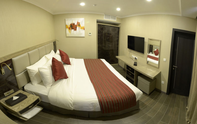 Ramada By Wyndham Bishkek Centre Hotel Exterior photo