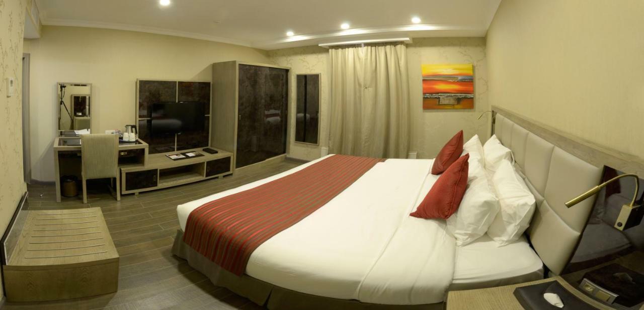 Ramada By Wyndham Bishkek Centre Hotel Exterior photo