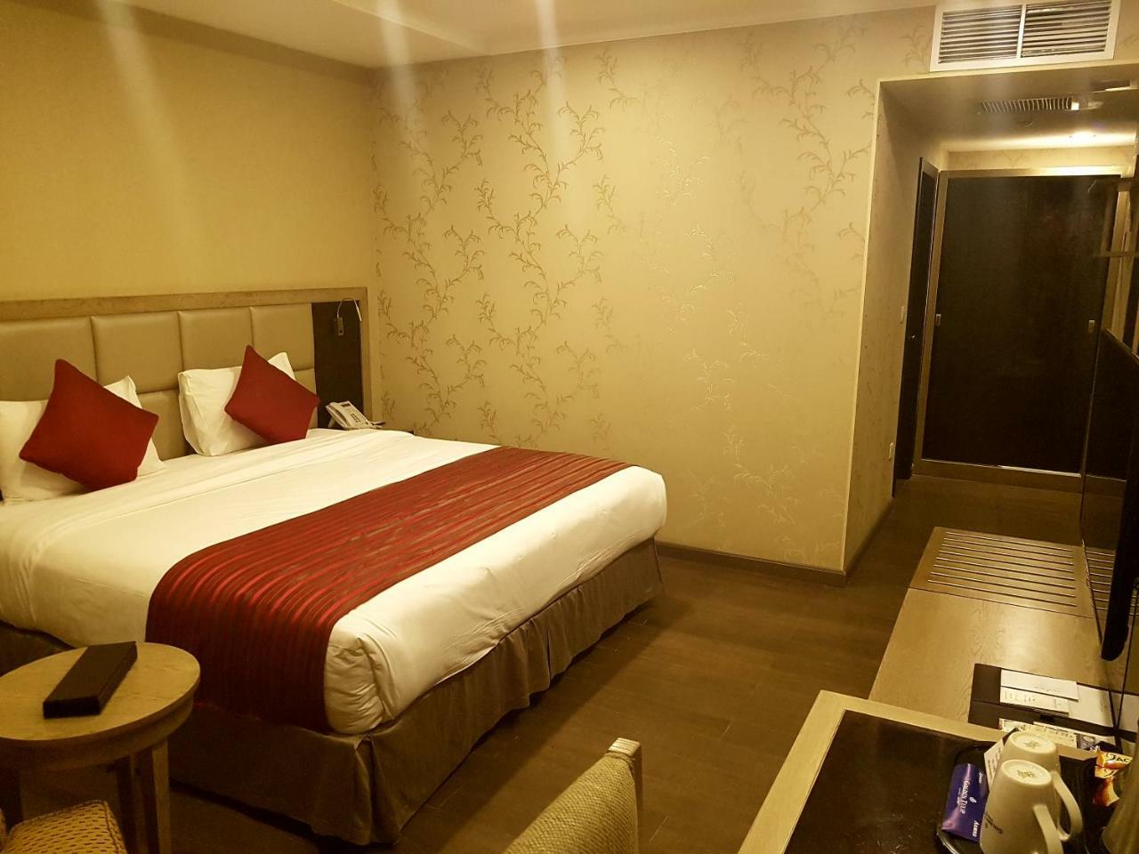 Ramada By Wyndham Bishkek Centre Hotel Exterior photo