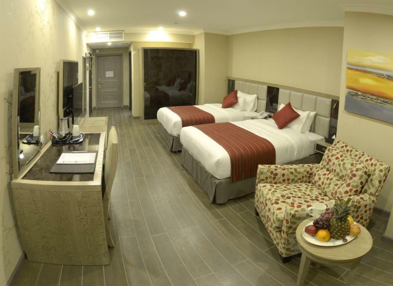 Ramada By Wyndham Bishkek Centre Hotel Exterior photo