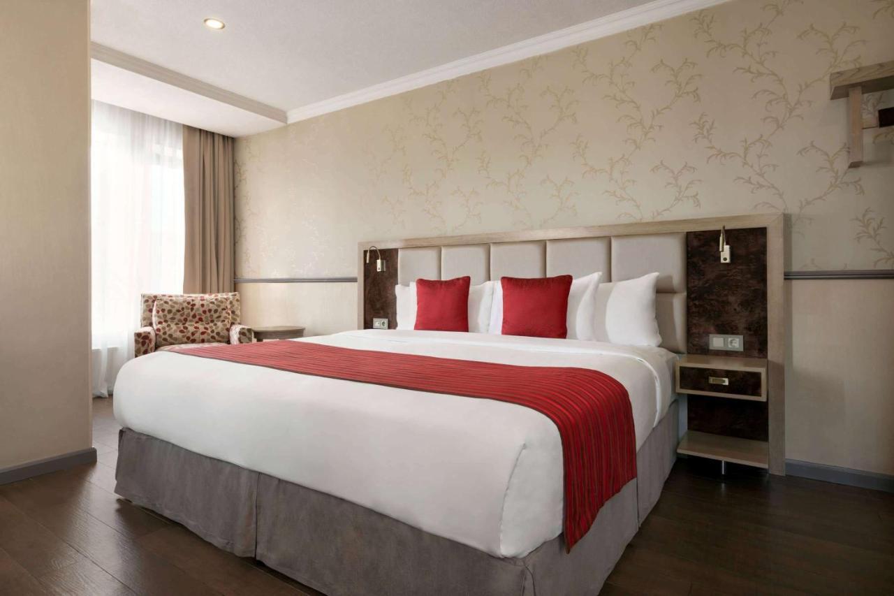 Ramada By Wyndham Bishkek Centre Hotel Exterior photo