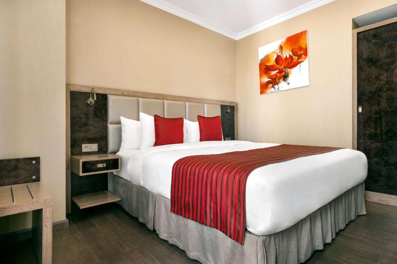 Ramada By Wyndham Bishkek Centre Hotel Exterior photo